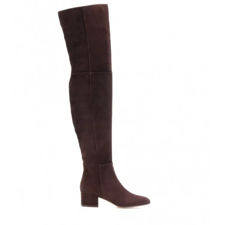 Women's grey suede over-the-knee flat boots with pointed toe and thick rubber sole on a neutral background