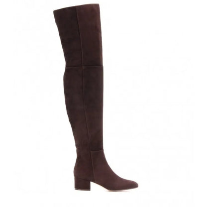 Women's grey suede over-the-knee flat boots with pointed toe and thick rubber sole on a neutral background