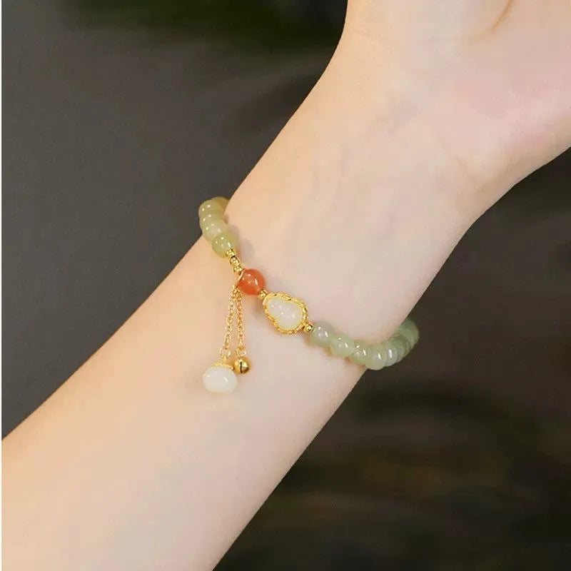 Qingshui jade women's bracelet with gold gourd charm and fu character on 6mm beads