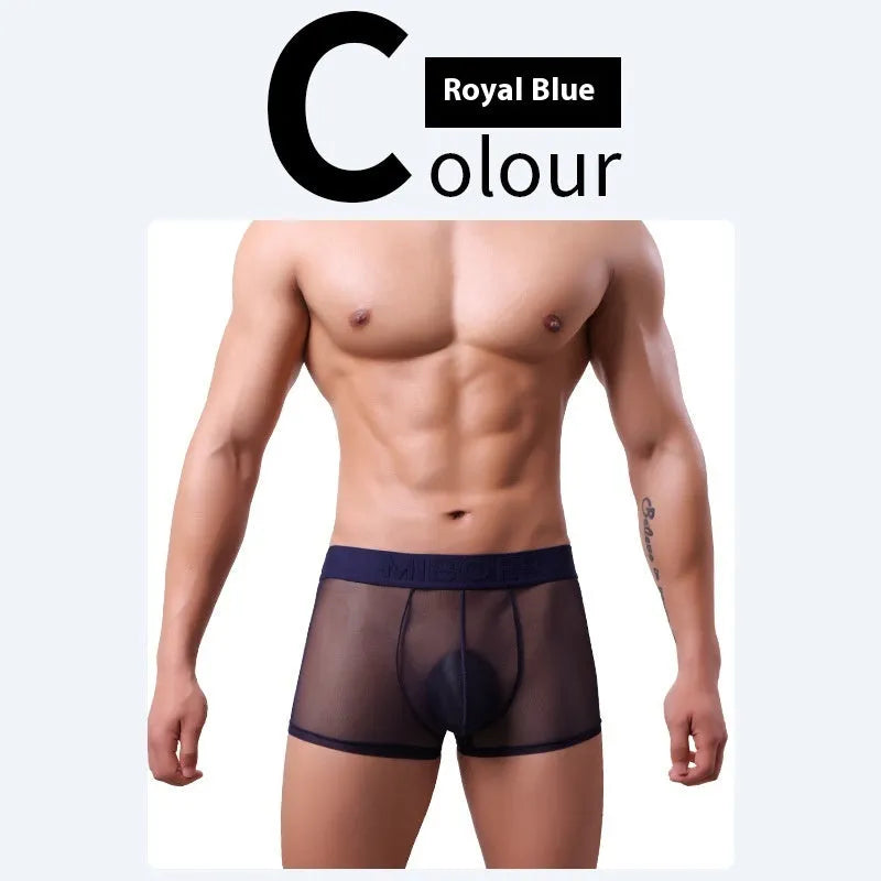 Men's thin knit boxer shorts in black, laid flat to show seamless design and waistband.