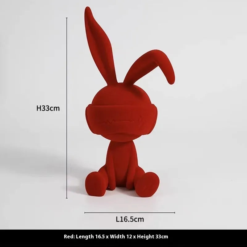 Green suede blindfold rabbit resin table ornament on a wooden shelf, showing detailed texture and 12cm height