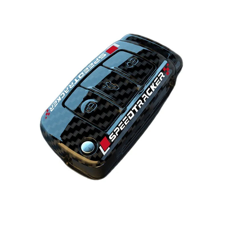 Carbon fibre style car key cover with a mirrored surface element, shown in black and white.