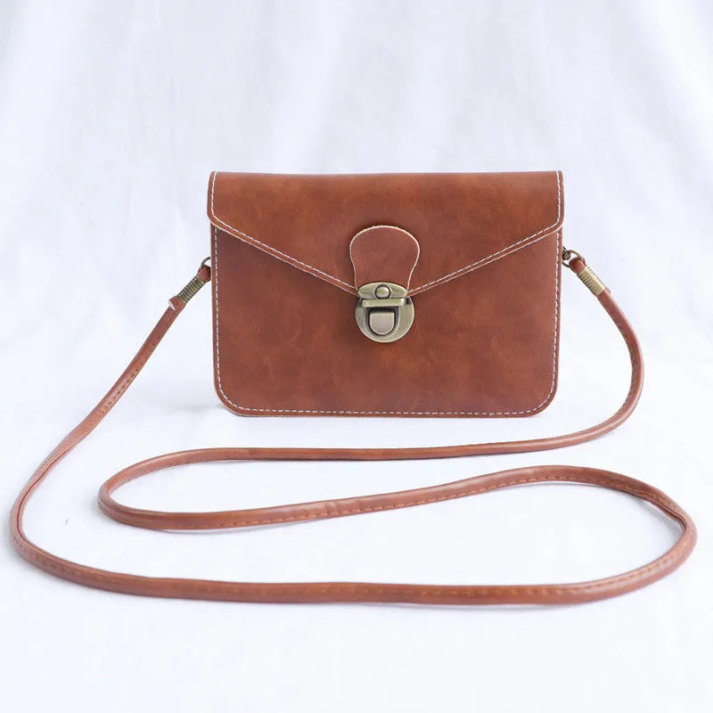 Retro soft brown crossbody messenger bag with a flap and lock closure
