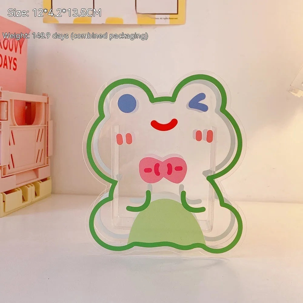 Square transparent acrylic storage box with printed character theme containing coloured pens