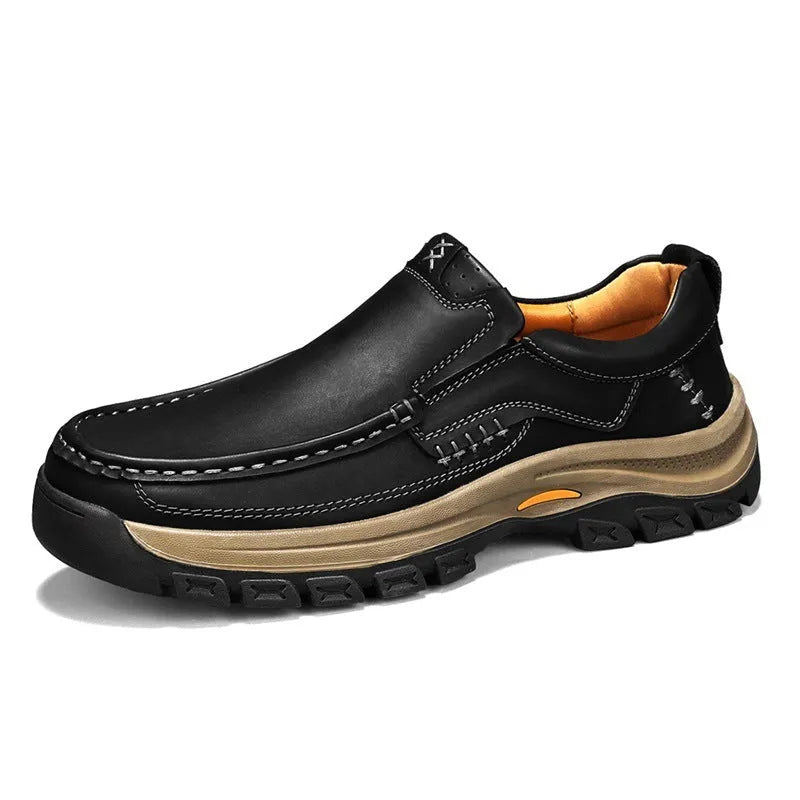 Men's black leather mountaineering shoes with thick rubber sole and round toe.