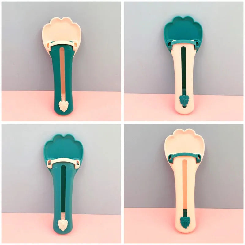 Green and pink pet food scoop and squeezer dispenser for cats and dogs.