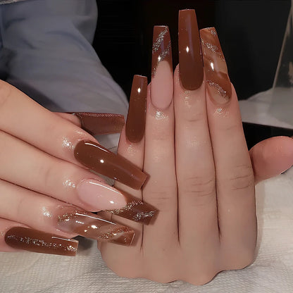 24 maple leaf red French tip press-on nails in open box showing long nail patch design