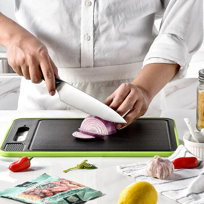 Grey square aluminium cutting board with double-sided design showing grinding teeth and knife sharpener