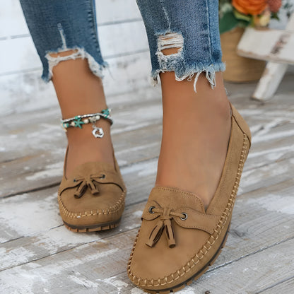 Women's casual suede flat shoes with decorative bow and round toe in apricot colour