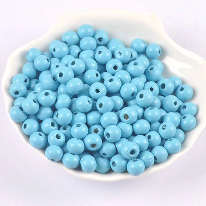 100 round wooden beads in 6mm to 12mm sizes, lotus wood with dyed surface for DIY crafts