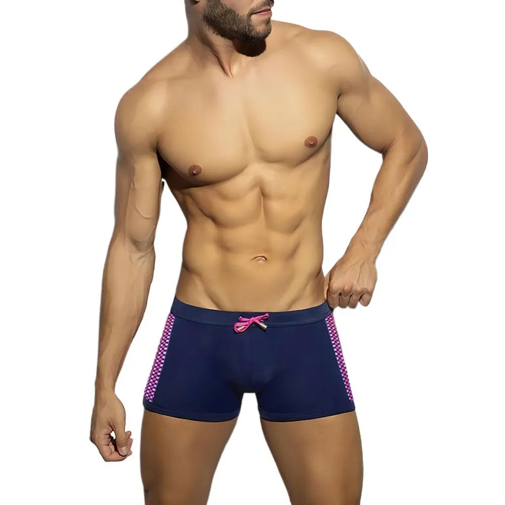 Men's yellow and black polka dot print swimming boxers with briefs style and quick-dry nylon fabric.