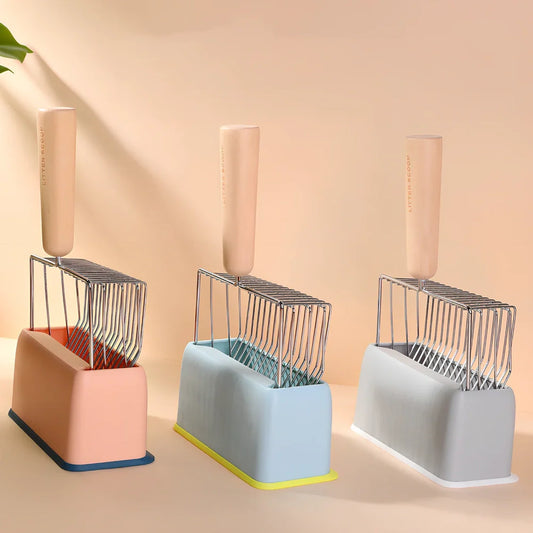 Metal cat litter shovel with wooden handle measuring 7x28x8cm with pink base option