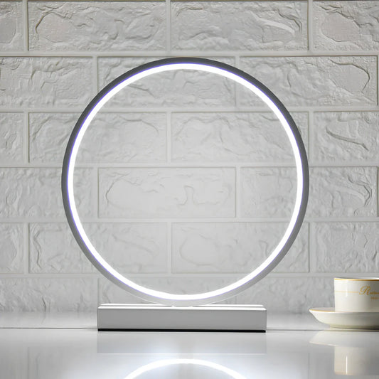 White minimalist bedside lamp with 30cm diameter shade and simple button controls