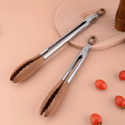 Stainless steel barbecue food tong with wood handle showing clamp mechanism and length measurement