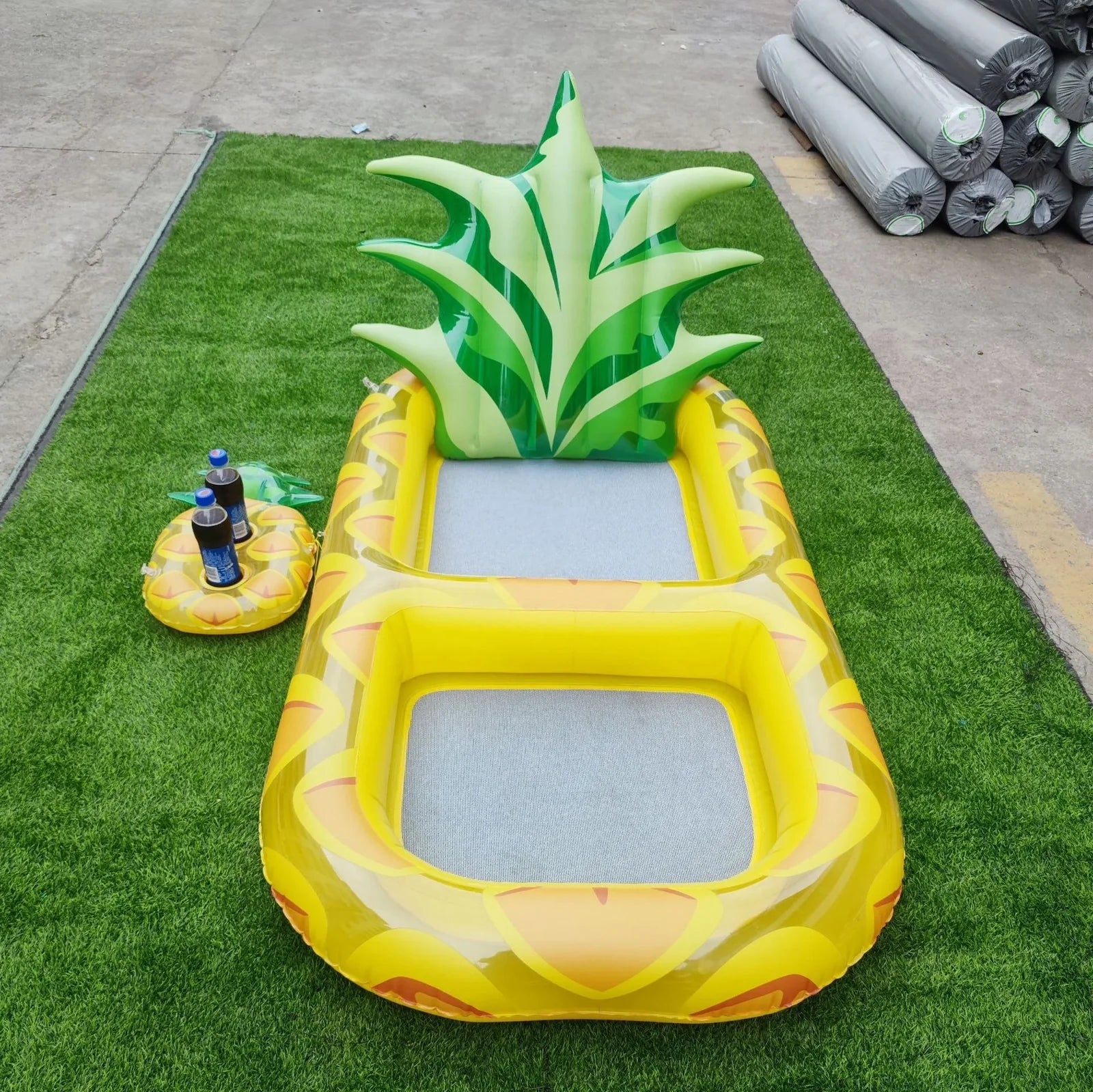 Yellow pineapple-shaped inflatable pool float with drink holder and ergonomic headrest design