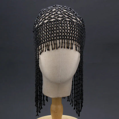 Silver and black belly dance hat with handmade beading and long tassels for performance hair ornamentation