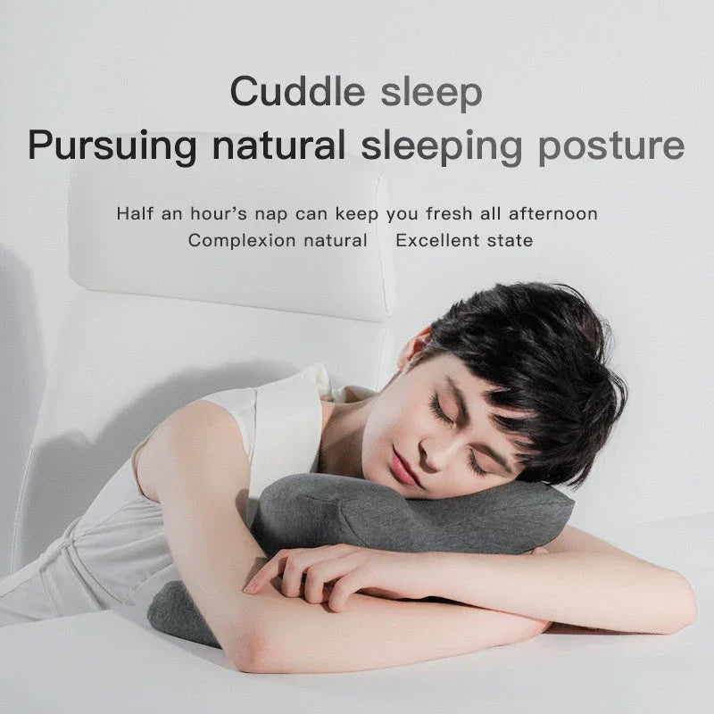 Ergonomic memory foam nap pillow with unique 'butterfly' shape design for comfortable desk or classroom power naps