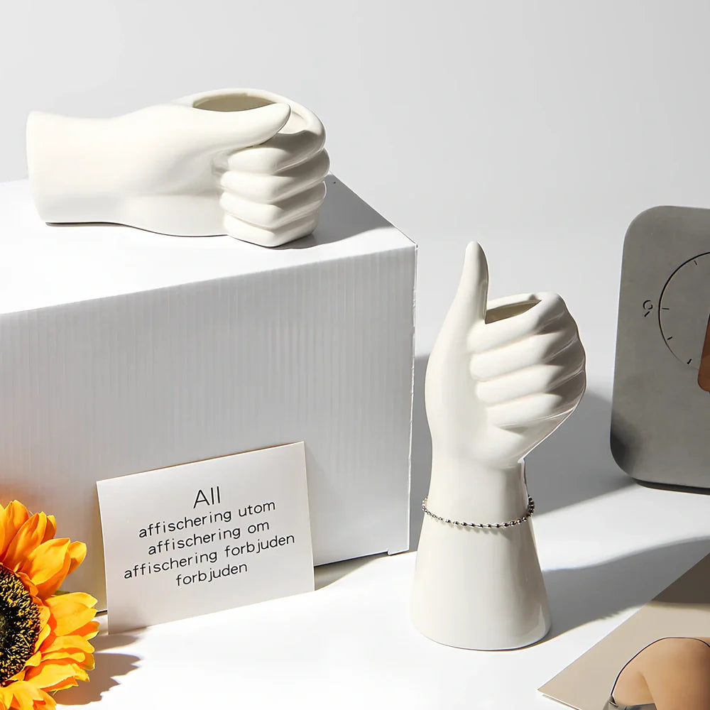 Ceramic human body vase with colour glaze finish showing decorative figures patterns, displayed as hanging ornament