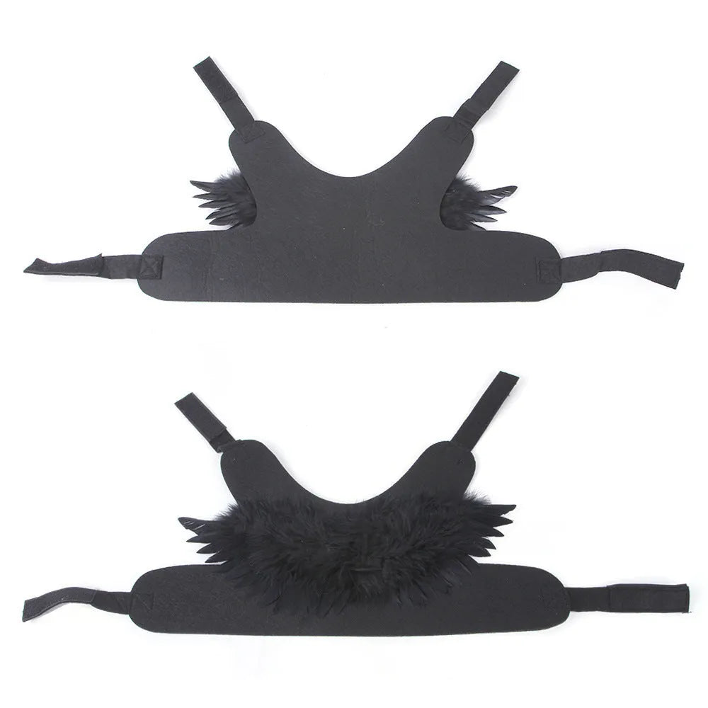 Black and white angel wings costume for dog or cat, made of felt fabric.