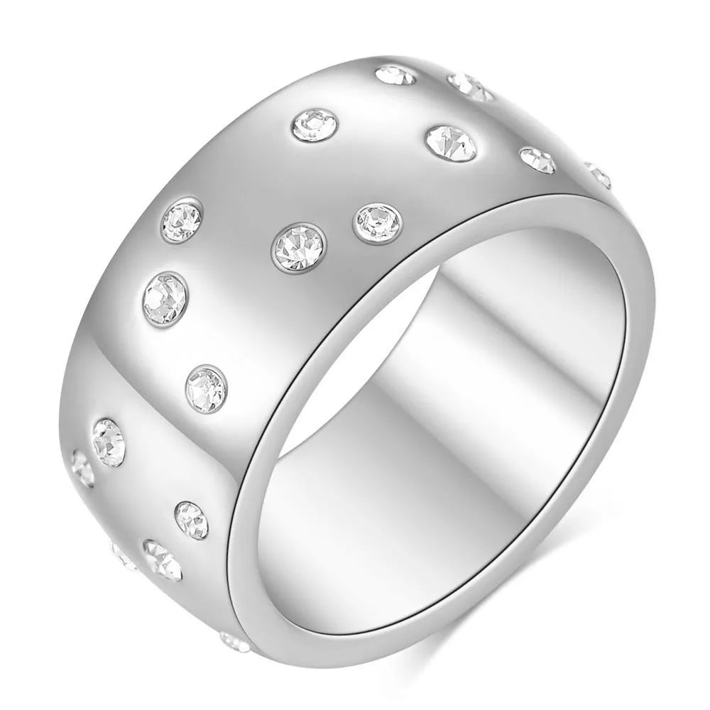 Geometric titanium steel women's couple ring with diamond treatment in black, gold, rose gold, and steel colours.