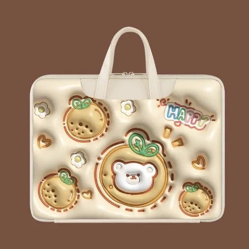 PU leather inflatable laptop bag with strap, shown in a cartoon pattern design, hanging from a suitcase handle.