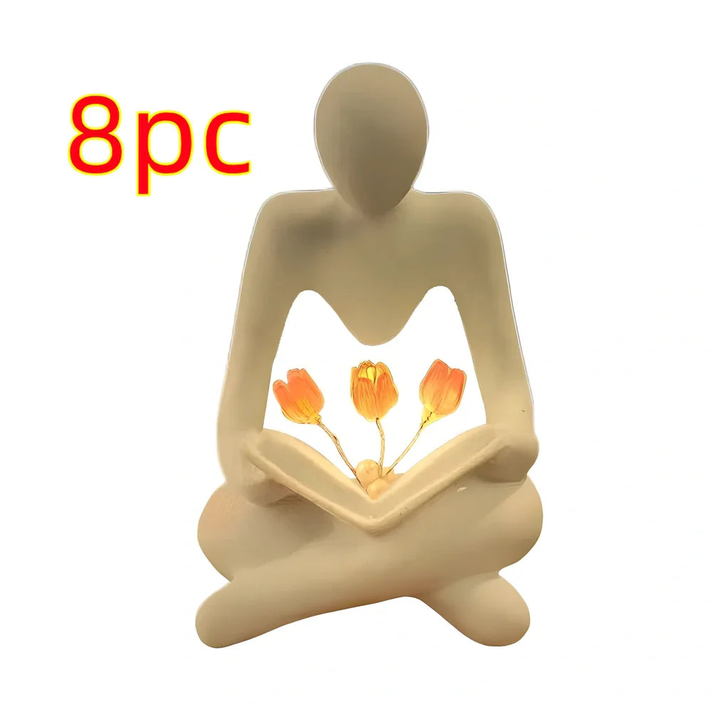 Nordic abstract thinker statue with tulip book night lamp measuring 7x6.3x11.5cm
