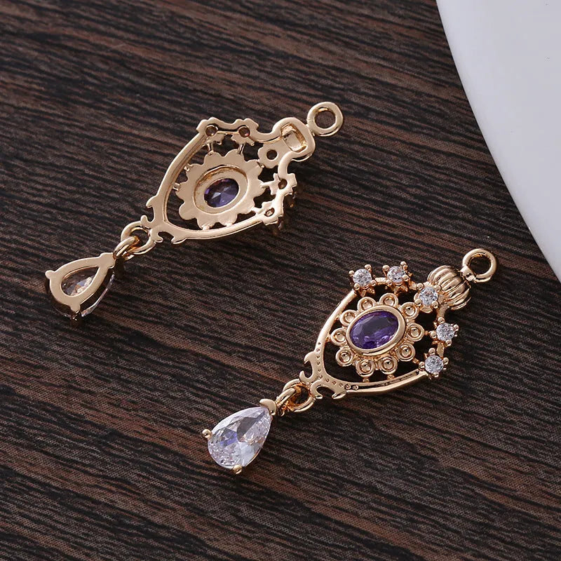 Small copper water drop pendant with zircon detailing in five colour options.