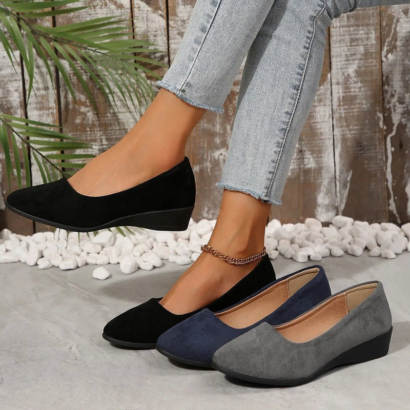 Women's plus size pointed toe wedge pumps with suede uppers and a shallow mouth cut, featuring a low short stout rubber sole for casual daily wear, available in black, grey, blue, khaki, and light brown colours in sizes 36 to 43.