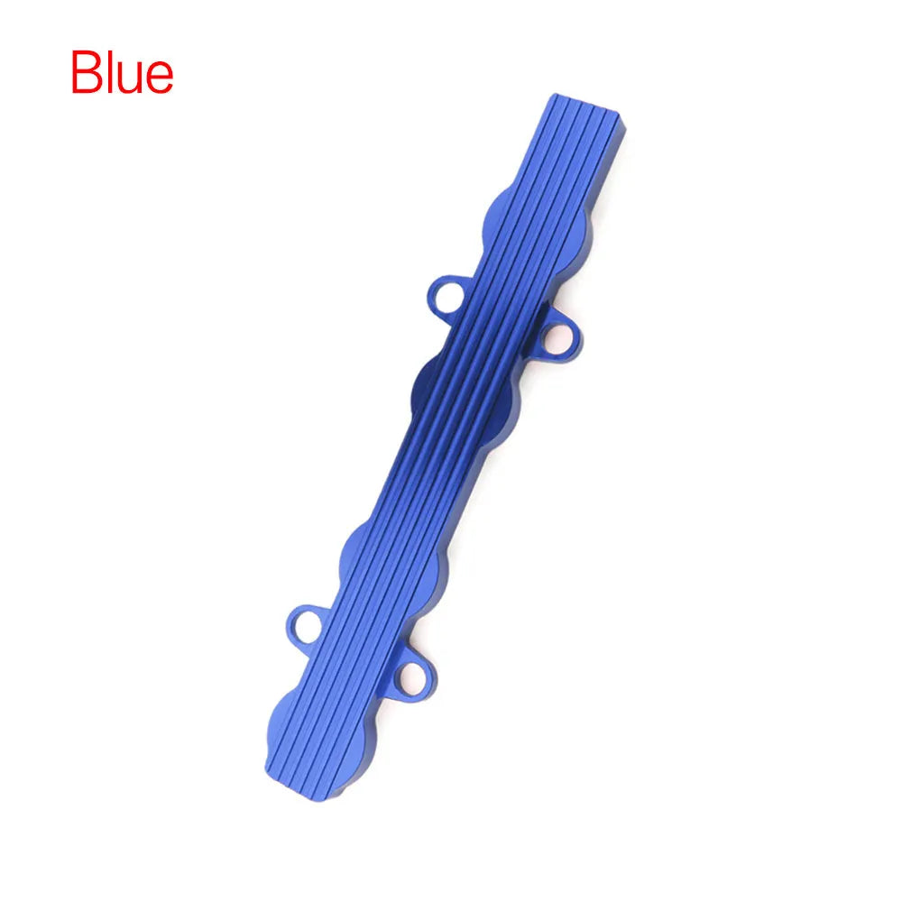 Aluminium alloy car engine wiring harness housing in blue, red, and silver colours