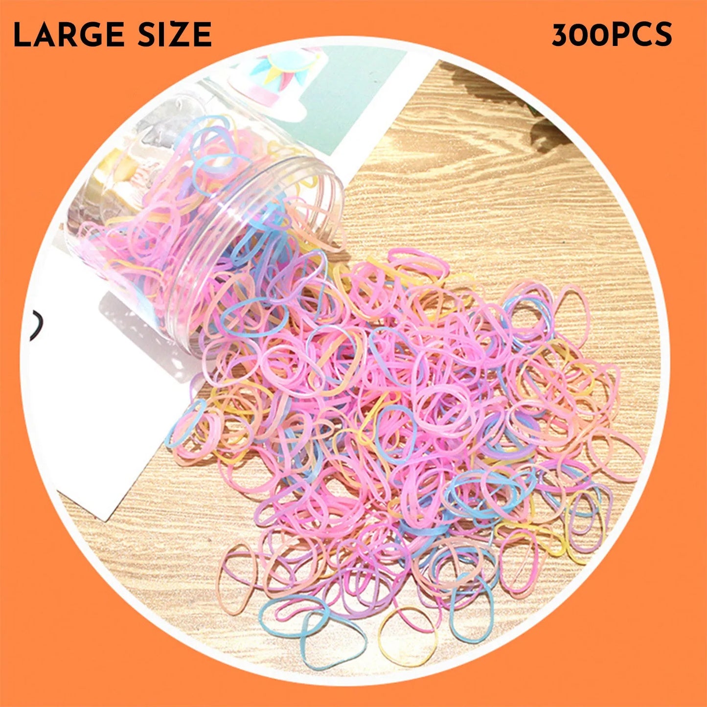 Multicoloured assortment of thin TPU elastic hair bands for babies and children in a reusable plastic container.