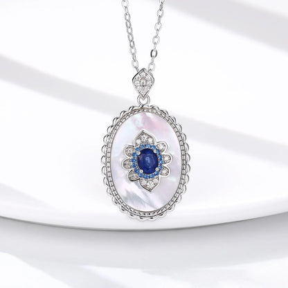 Elegant sapphire and diamond pendant necklace made of 925 sterling silver with a sleek geometric design and O-chain