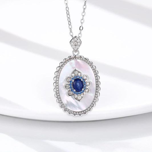 Elegant sapphire and diamond pendant necklace made of 925 sterling silver with a sleek geometric design and O-chain