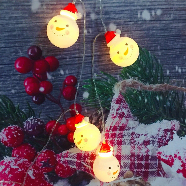 Festive Navidad LED string lights in Snowman, Snow Ball, and Santa Claus colors for holiday decorations