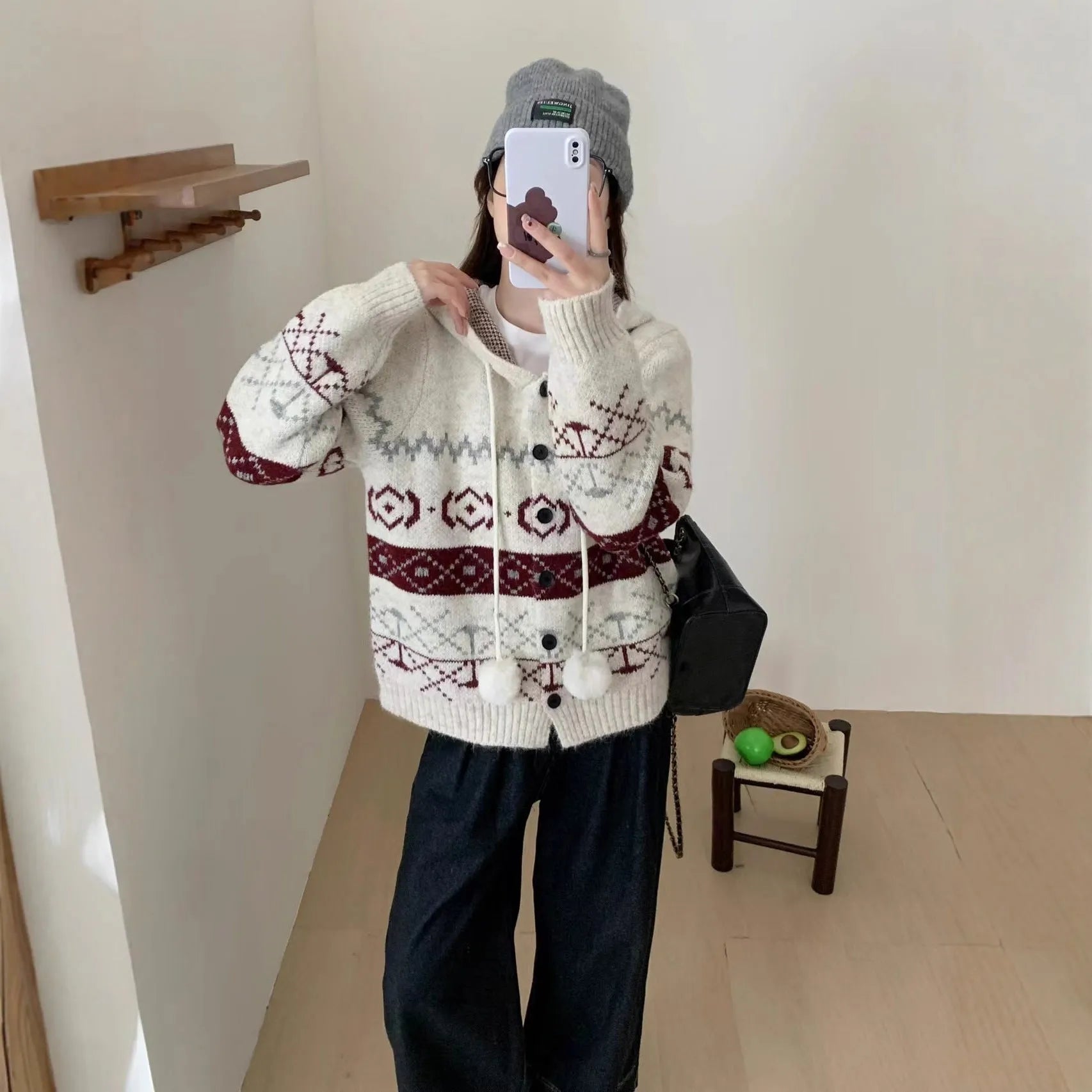 Women's loose-fit brocade sweater coat with geometric pattern in milky white colour, showing long sleeves and regular sleeve cut