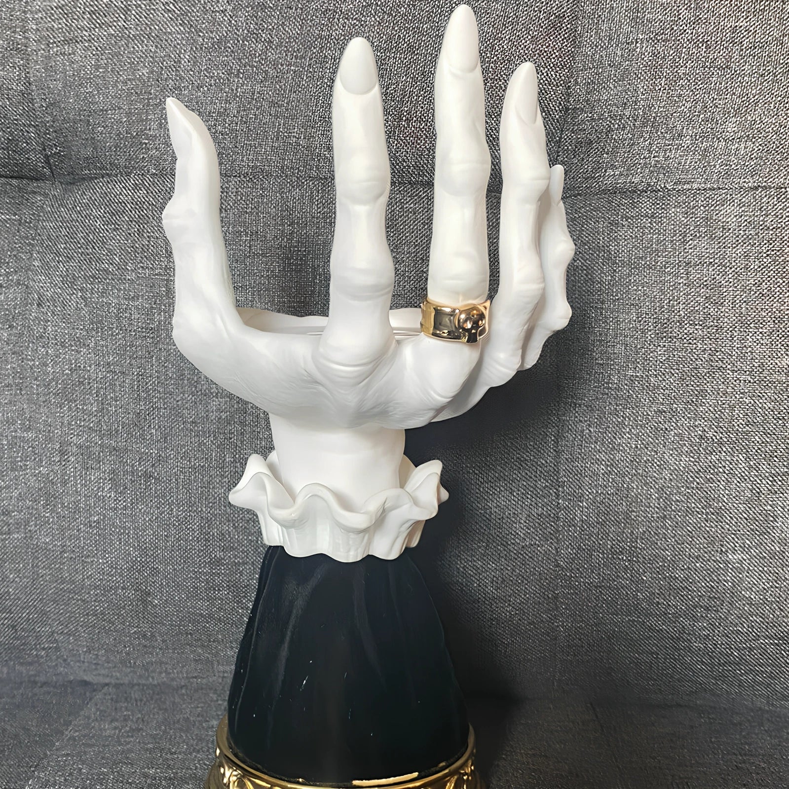 Halloween witch palm candle holder with handmade resin construction measuring 8x8x25cm