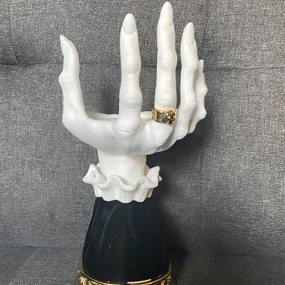 Halloween witch palm candle holder with handmade resin construction measuring 8x8x25cm