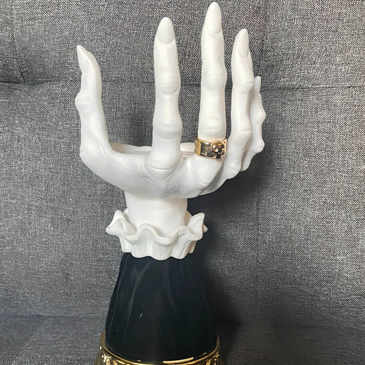 Halloween witch palm candle holder with handmade resin construction measuring 8x8x25cm