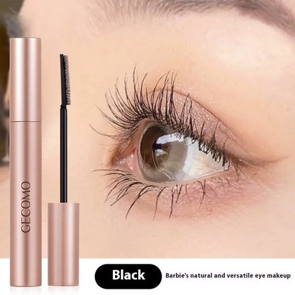 Black mascara tube for curly long lashes, 14cm tall with 8g content.