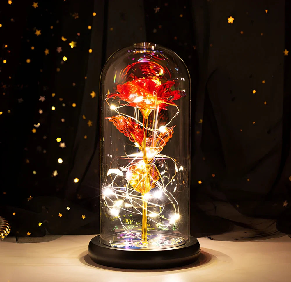 Little Prince rose arrangement under 20x9cm glass dome with gold foil flowers