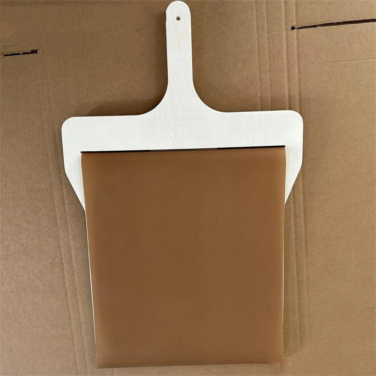 Premium natural wood pizza peel with large surface area for easy transfer of pizzas, cakes, and breads from oven to table