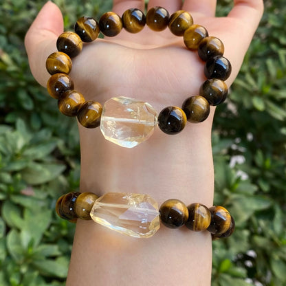 Handmade crystal bracelet with diamond gourd, disc, and prayer wheel beads in 8mm and 10mm sizes.