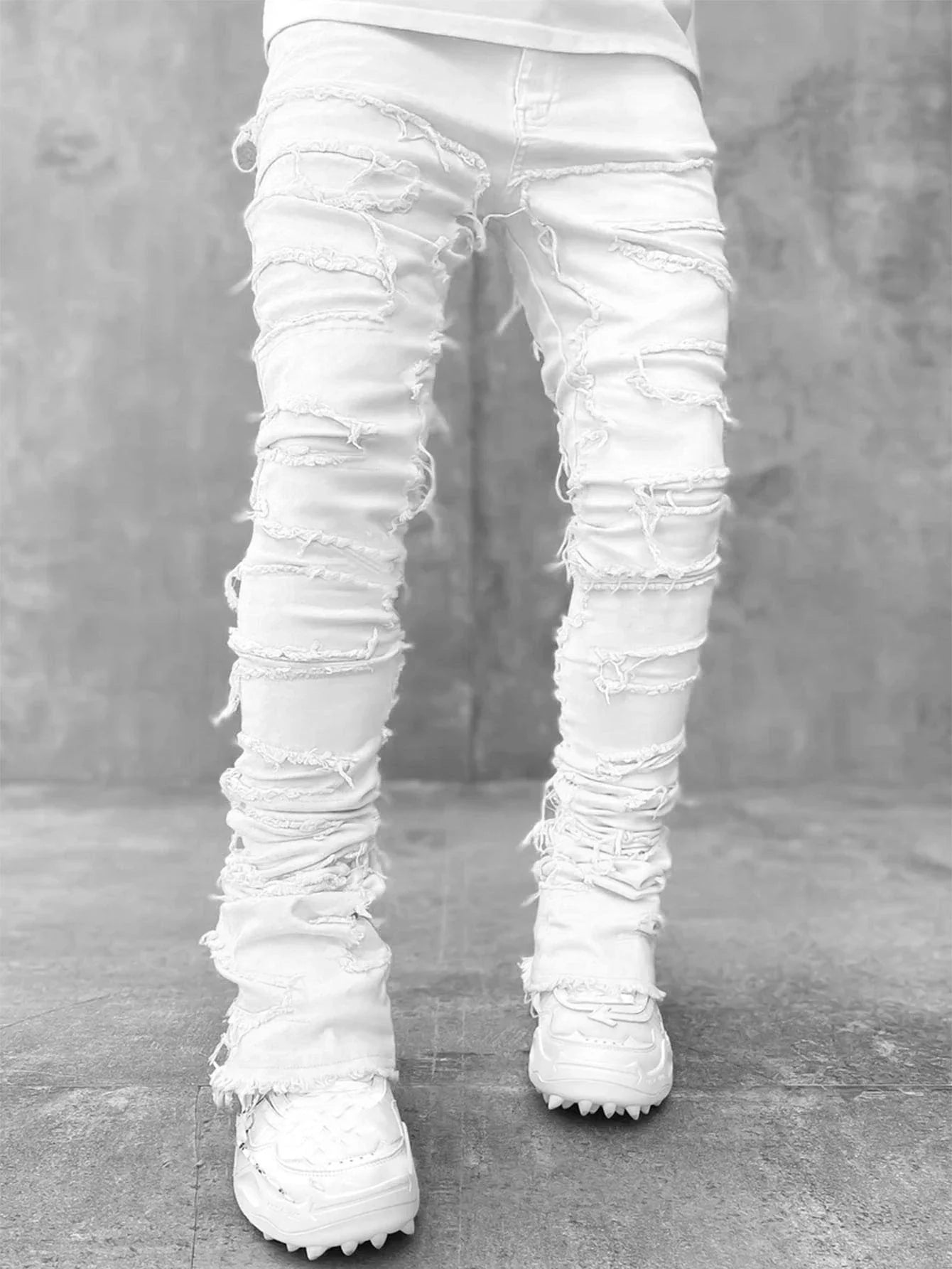 Stylish patched men's jeans with tight, stacked fit and variety of vibrant color options