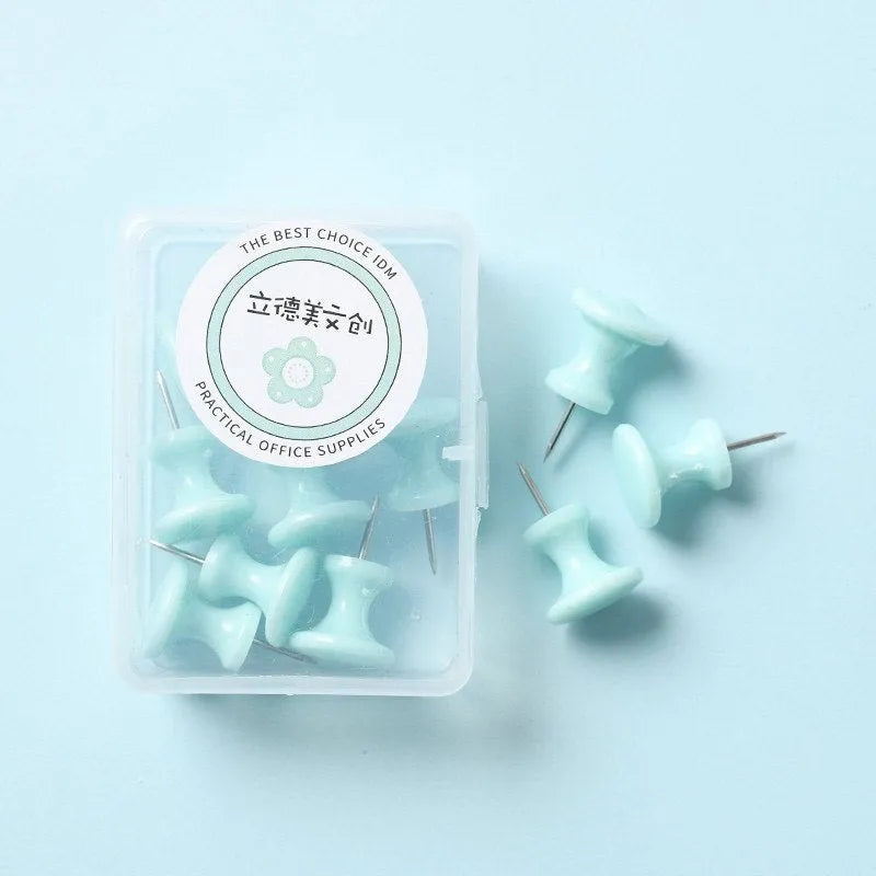Macaron colour plastic push pins in cherry blossom pink, mint green and lavender, available in large and small sizes