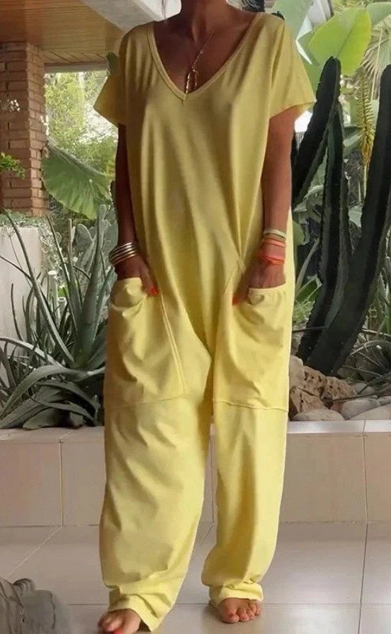 A stylish and comfortable oversized jumpsuit with roomy pockets, available in a variety of vibrant colors.