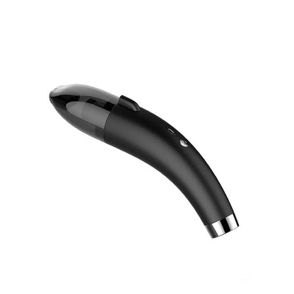 Handheld cordless car vacuum cleaner in black colour with USB charging cable, shown next to a car seat.