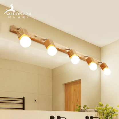 Circular mirror-finish LED wall lamp with 24cm diameter showing three light colour options