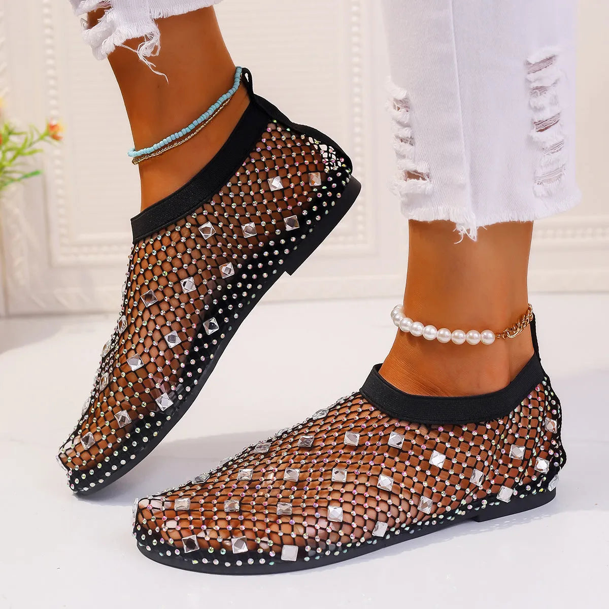 Women's flat sandals with mesh upper, colourful rhinestones, and rubber sole in sizes 35-43