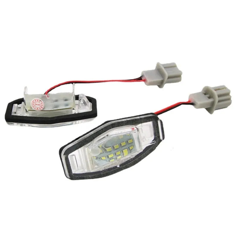 Honda Civic LED licence plate light showing white 6500-7000K illumination with plastic housing