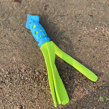 Blue cuttlefish-shaped dog chew toy with squeaker measuring approximately 39 cm
