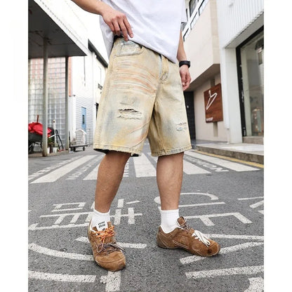 Men's light blue ripped denim shorts with straight-leg style and mid-waist design